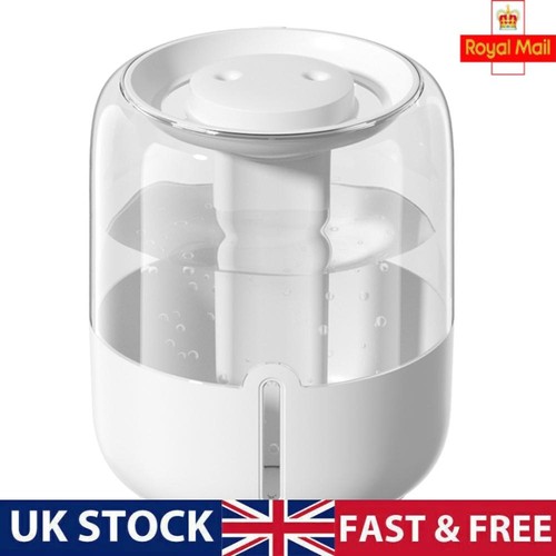Dual nozzle humidifier with - nozzle,